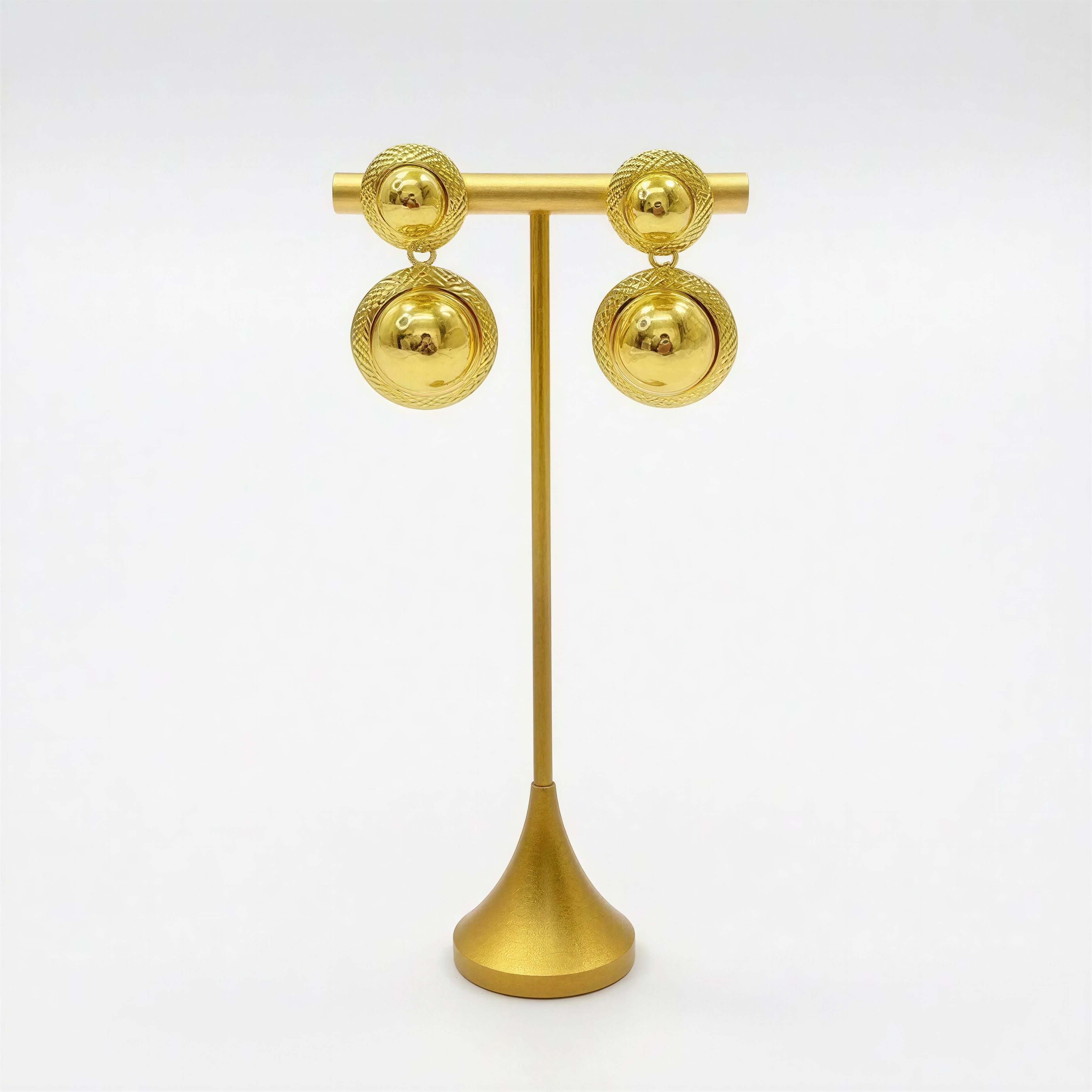 Aretes AR007 - Doble Círculo Dorado en Rodio