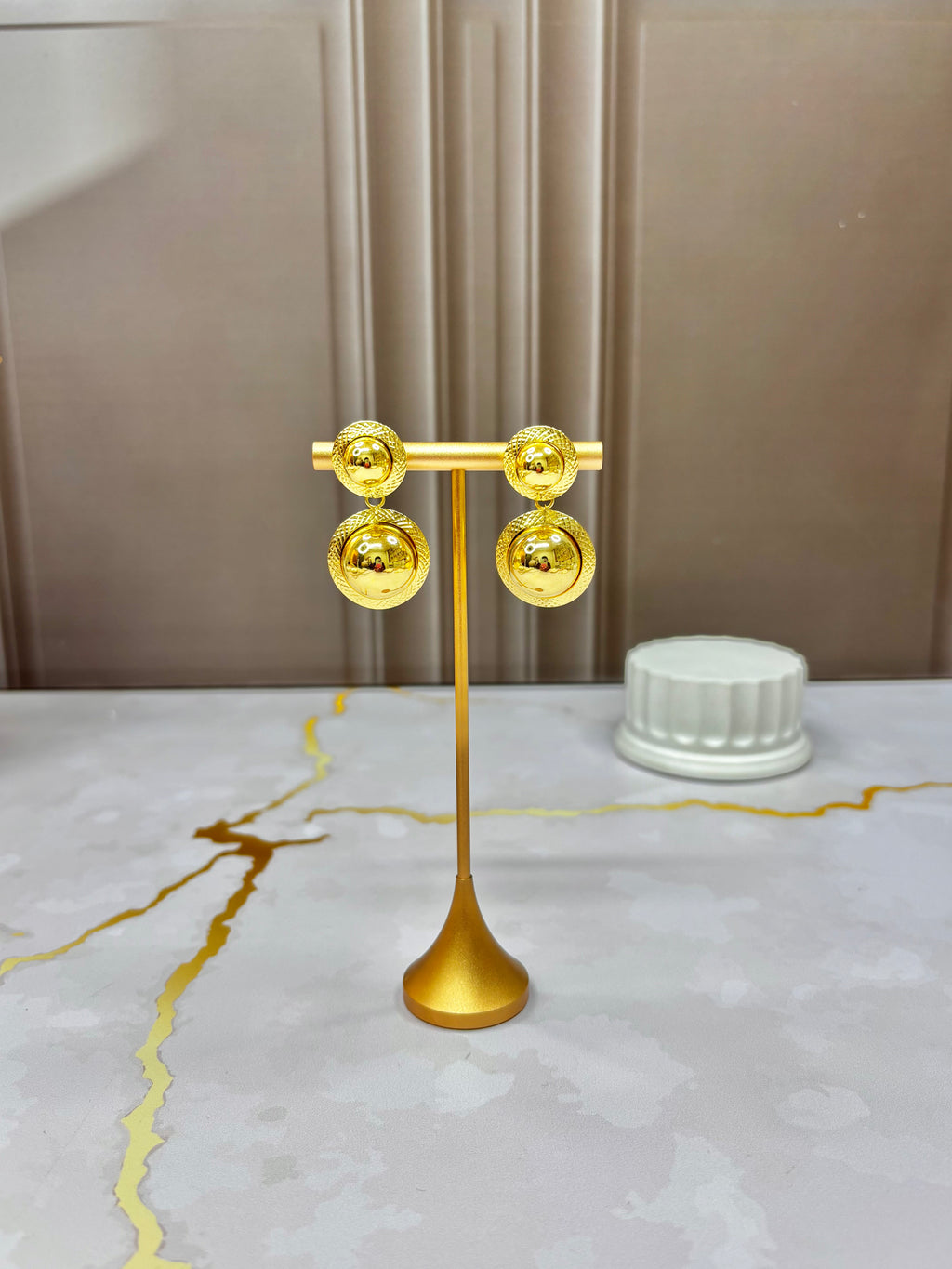 Aretes AR007 - Doble Círculo Dorado en Rodio