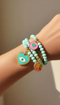 Set x3 pulseras cristales murano con dijes zamak covergold