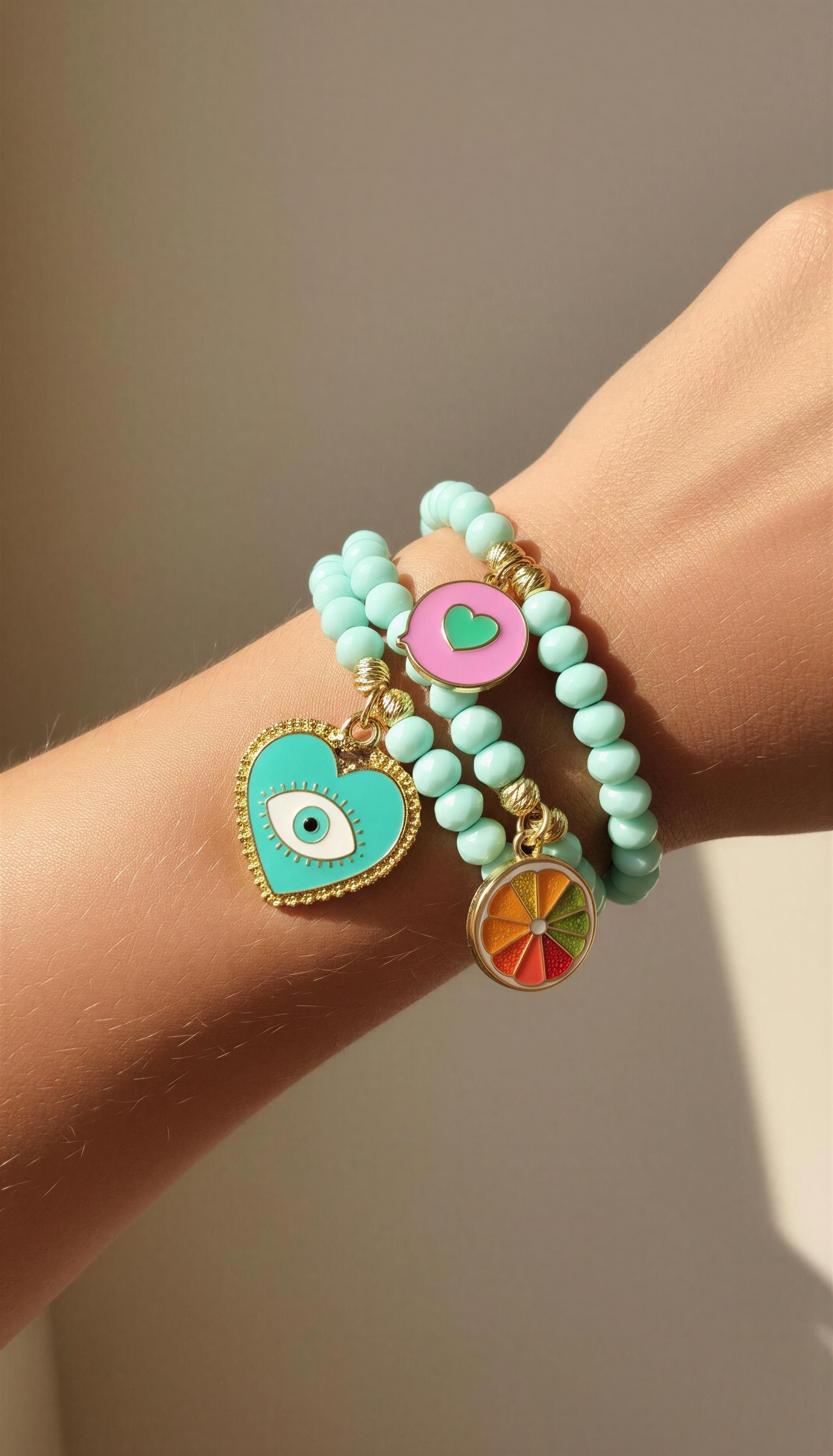 Set x3 pulseras cristales murano con dijes zamak covergold